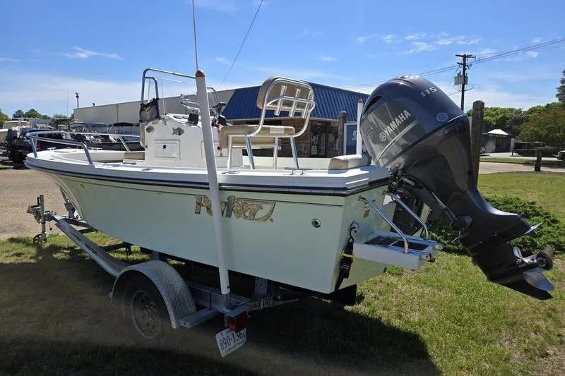 Slide: The Image of 2018 Parker 1801 Center Console boat with Yamaha engine on trailer. - 13