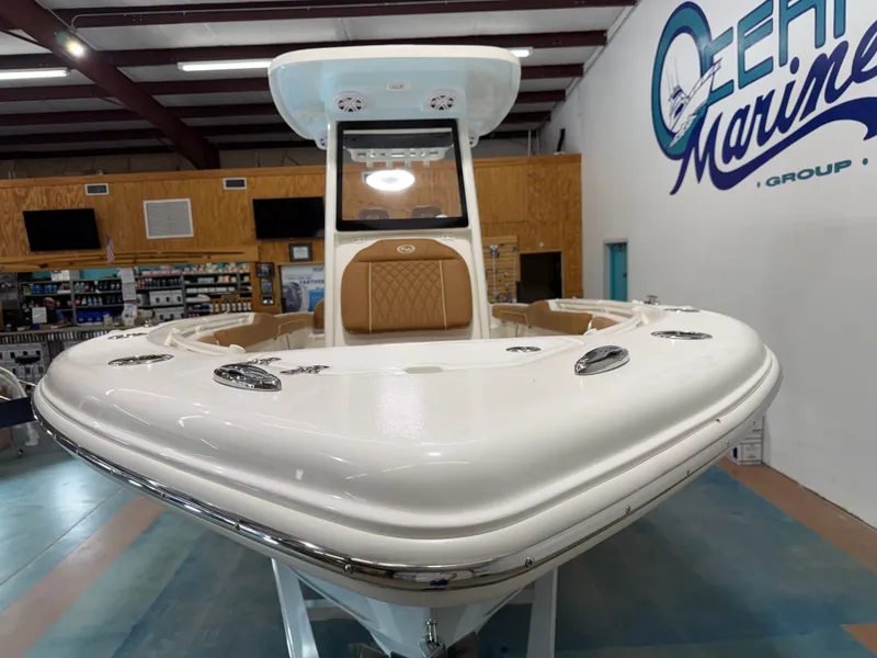 Slide: The Image of Key West 239 FSR 2026 boat in showroom. - 26