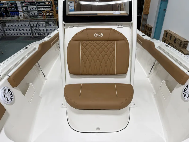 Slide: The Image of Interior of Key West 239 FSR boat, brown upholstery, model year 2026. - 27