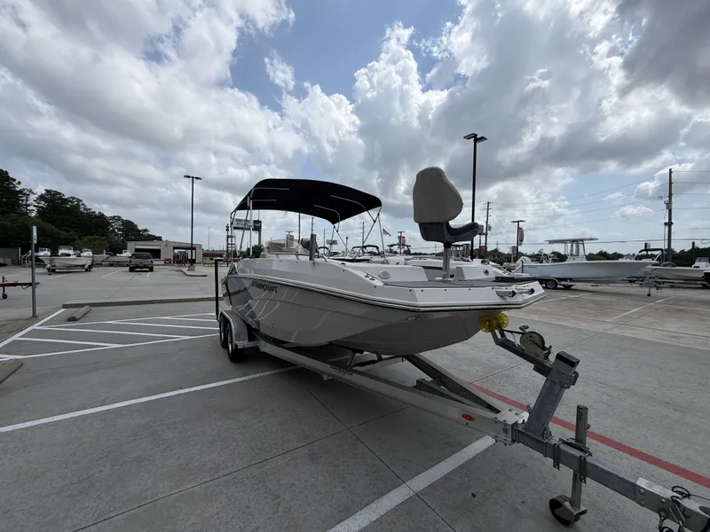 Slide: The Image of 2023 Starcraft SXV-211 boat parked on trailer outdoors. - 6