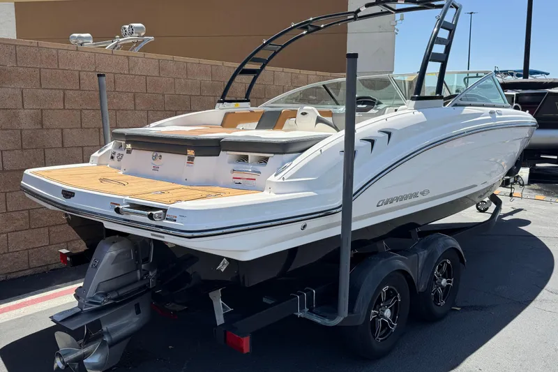 Slide: The Image of 2023 Chaparral 23 SSi boat on trailer, featuring sleek design and modern amenities. - 5