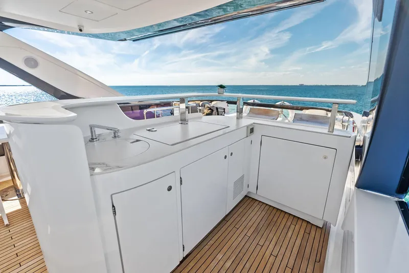 Slide: The Image of Luxurious 2021 Azimut Fly 78 yacht deck with sleek outdoor kitchen and ocean view. - 30