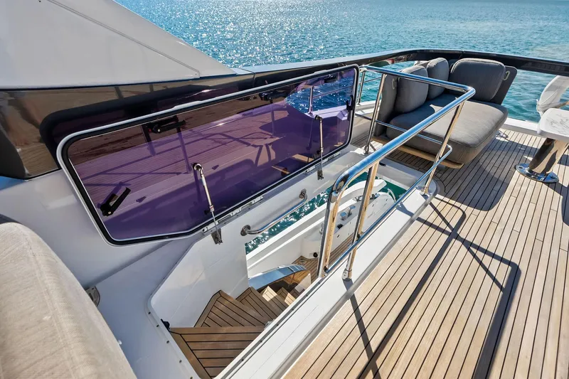 Slide: The Image of Luxurious 2021 Azimut Fly 78 yacht deck with elegant seating and ocean view. - 36