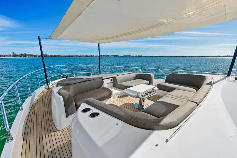 Slide: The Image of Luxurious 2021 Azimut Fly 78 yacht deck with elegant seating and ocean view. - 40