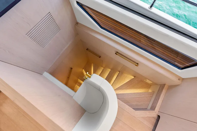 Slide: The Image of Staircase on 2021 Azimut Fly 78 yacht with elegant wood finish and modern design. - 55