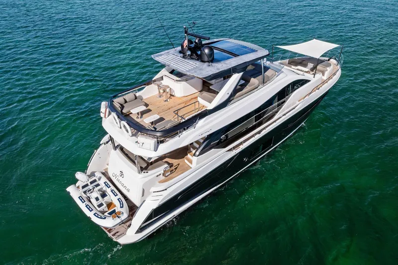 Slide: The Image of Luxurious 2021 Azimut Fly 78 yacht cruising on clear blue waters. - 67