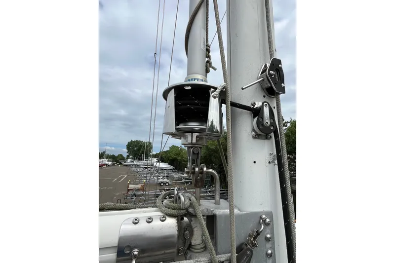 Slide: The Image of Mast and rigging of 1980 Cheoy Lee 43 Pilot House sailboat, featuring a furler system. - 14