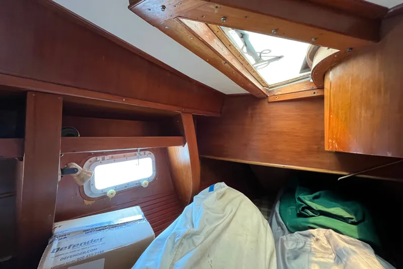 Slide: The Image of Interior cabin of 1980 Cheoy Lee 43 Pilot House with wooden finish and skylight. - 84