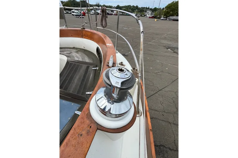 Slide: The Image of 1980 Cheoy Lee 43 Pilot House deck with winch and wooden trim. - 19