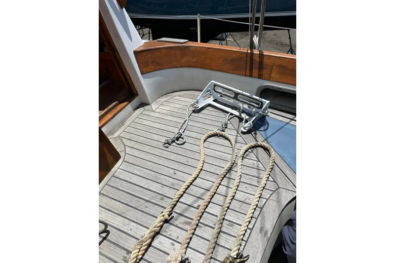 Slide: The Image of Deck of 1980 Cheoy Lee 43 Pilot House with ropes and anchor. - 24