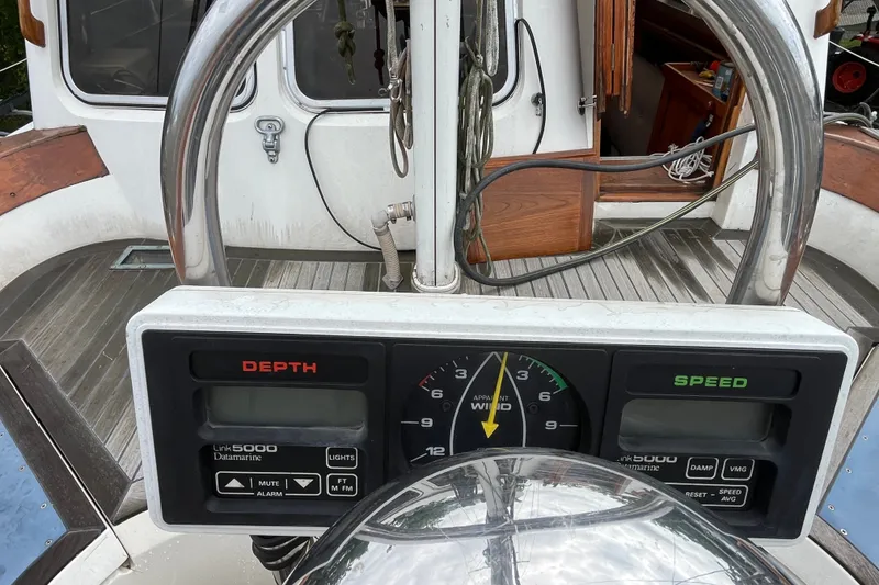 Slide: The Image of Cockpit of 1980 Cheoy Lee 43 Pilot House with depth and speed gauges. - 17