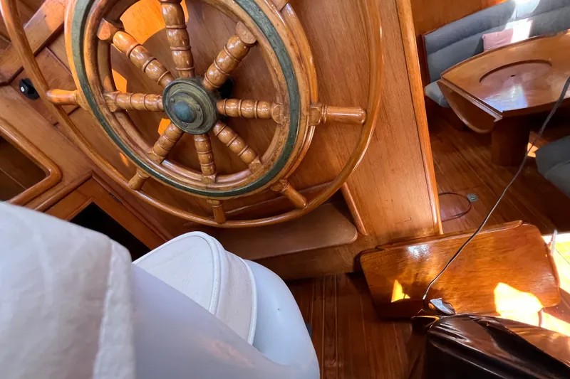 Slide: The Image of Wooden helm of 1980 Cheoy Lee 43 Pilot House yacht interior. - 30