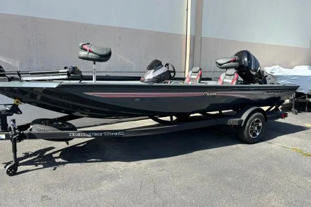 The Image of 2026 Ranger RT188 fishing boat with trailer, parked outdoors. - 0