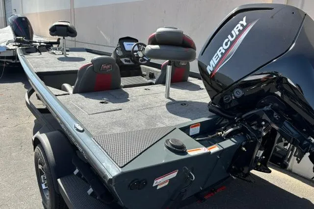 Slide: The Image of 2026 Ranger RT188 boat with Mercury engine, featuring spacious seating and modern design. - 2