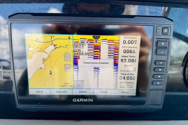 Slide: The Image of Garmin GPS display on 2023 Crownline Eclipse E235 XS boat, showing navigation and water temperature. - 23