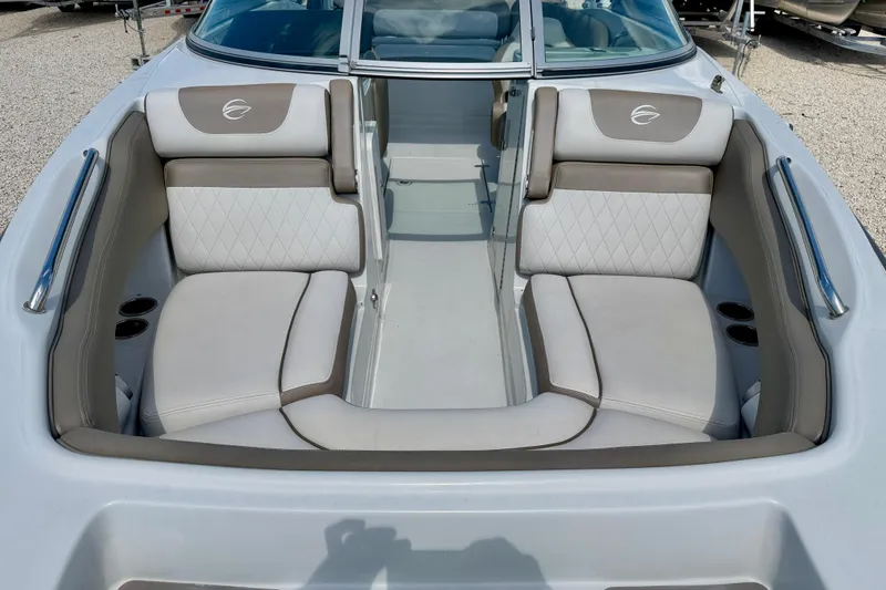 Slide: The Image of 2023 Crownline Eclipse E235 XS boat interior with luxurious seating and modern design. - 9