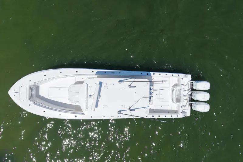 Slide: The Image of Aerial view of 2023 Invincible 36 Open Fisherman boat on water. - 12