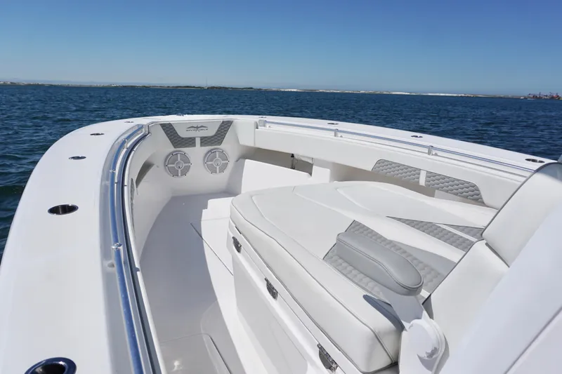 Slide: The Image of 2023 Invincible 36 Open Fisherman boat with sleek seating on open water. - 13