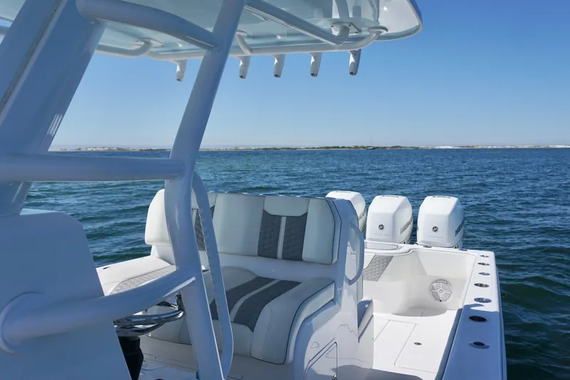 Slide: The Image of 2023 Invincible 36 Open Fisherman boat on calm ocean waters. - 21