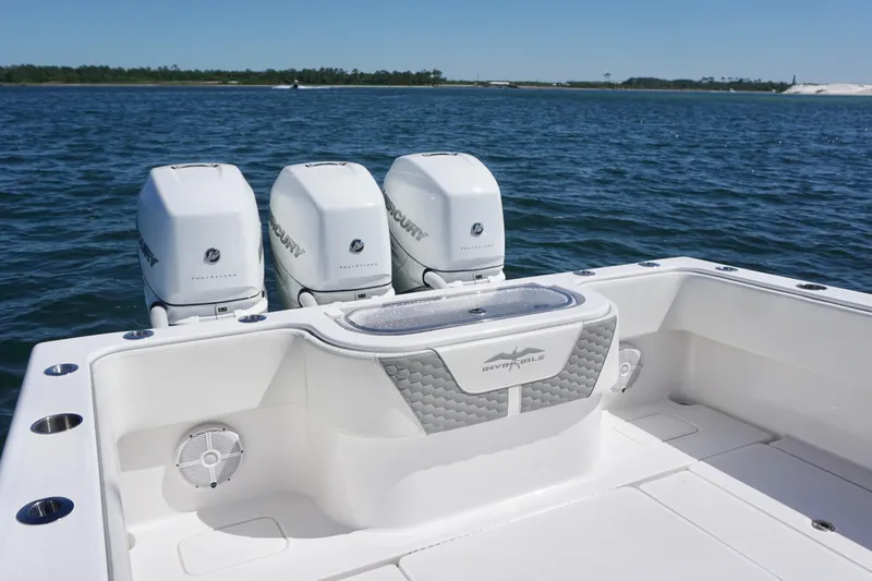 Slide: The Image of 2023 Invincible 36 Open Fisherman boat with triple Mercury engines on open water. - 22