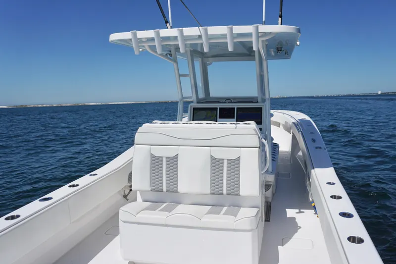 Slide: The Image of 2023 Invincible 36 Open Fisherman boat on open water, featuring sleek design and modern amenities. - 27