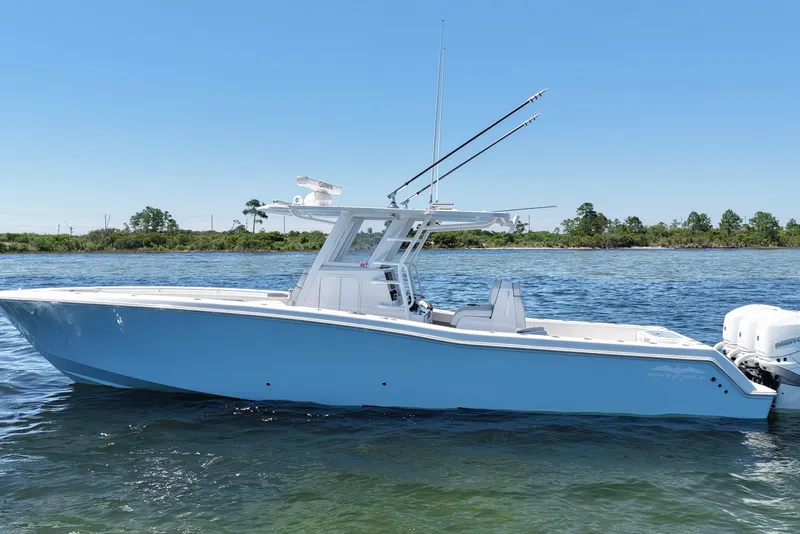 Slide: The Image of 2023 Invincible 36 Open Fisherman boat on calm water, side view. - 3