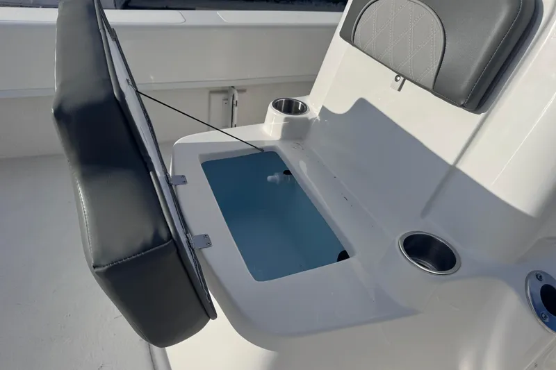 Slide: The Image of Sundance B22CCR 2026 boat seat with storage compartment and cup holders. - 11
