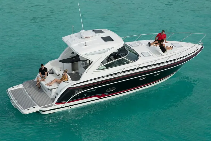 Slide: The Image of Manufacturer Provided Image: 2019 Formula 37 Performance Cruiser on turquoise water with people relaxing. - 3