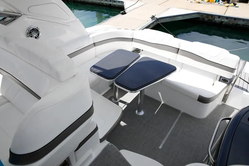 Slide: The Image of Manufacturer Provided Image: 2019 Formula 37 Performance Cruiser cockpit with seating and tables. - 8