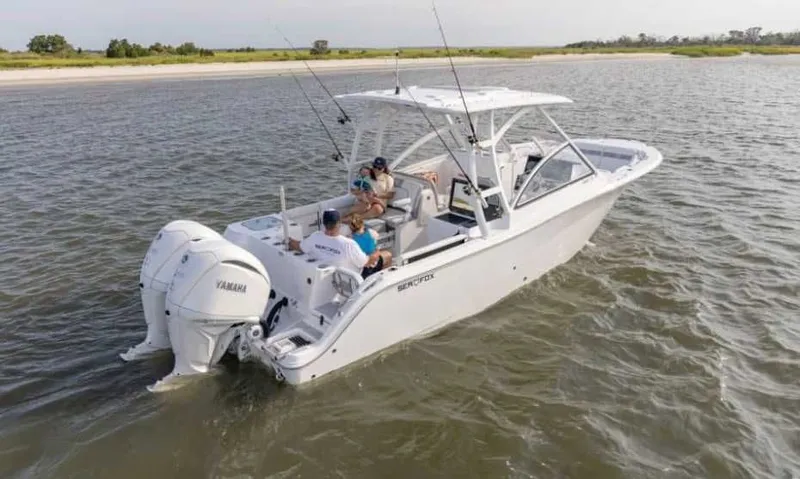 The Image of 2026 Sea Fox 288 Traveler boat on calm water with passengers. - 0