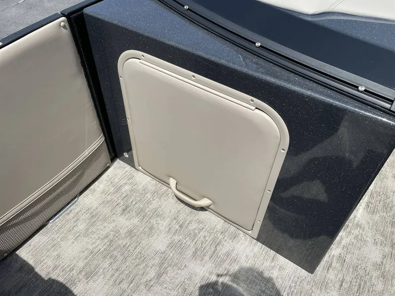Slide: The Image of Interior of 2021 Crest 270 Continental with storage compartment. - 11