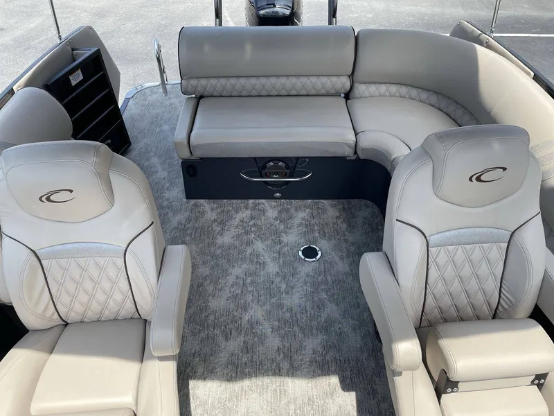 Slide: The Image of Interior of a 2021 Crest 270 Continental boat with luxurious seating. - 13