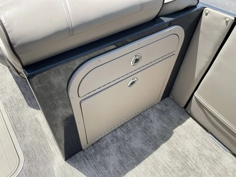 Slide: The Image of Interior of 2021 Crest 270 Continental with storage compartment. - 14