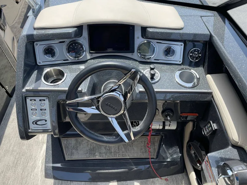 Slide: The Image of Dashboard of a 2021 Crest 270 Continental boat. - 27
