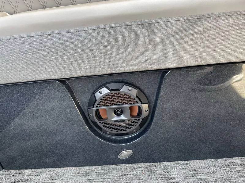 Slide: The Image of Speaker inside a 2021 Crest 270 Continental boat interior. - 41