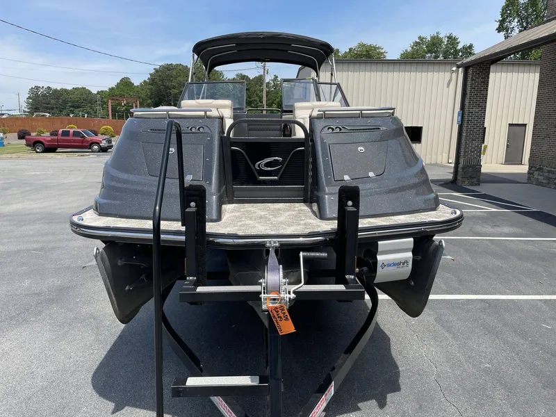 Slide: The Image of Rear view of a 2021 Crest 270 Continental boat on a trailer. - 7