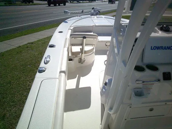 Slide: The Image of Interior view of a 2017 Robalo 246 Cayman boat by the roadside. - 11