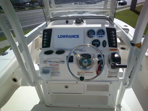 Slide: The Image of 2017 Robalo 246 Cayman helm with Lowrance system. - 5