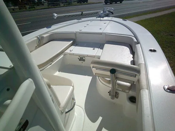Slide: The Image of 2017 Robalo 246 Cayman boat interior, white upholstery, spacious deck. - 7
