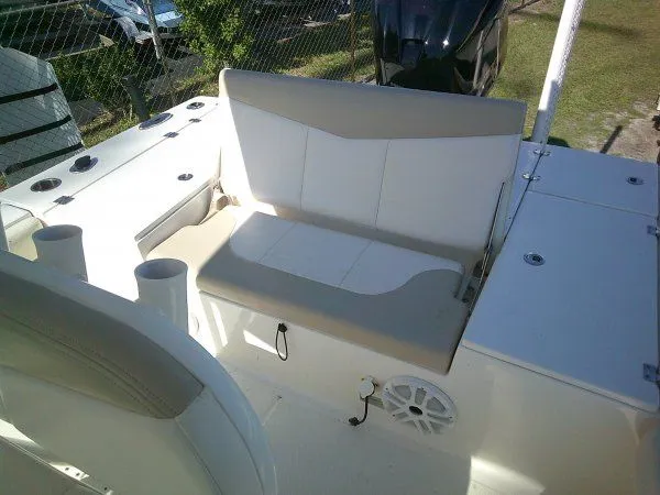 Slide: The Image of Interior of a 2017 Robalo 246 Cayman boat with seating area. - 9