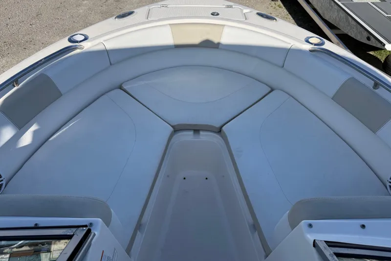 Slide: The Image of 2015 Robalo R227 Dual Console boat interior with spacious seating area. - 10