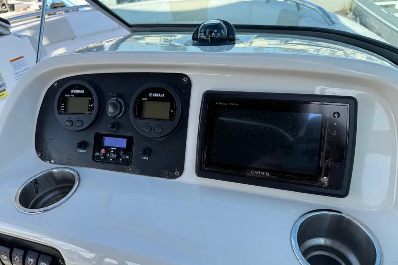 Slide: The Image of Dashboard of 2015 Robalo R227 Dual Console with Yamaha gauges and Garmin GPS. - 26