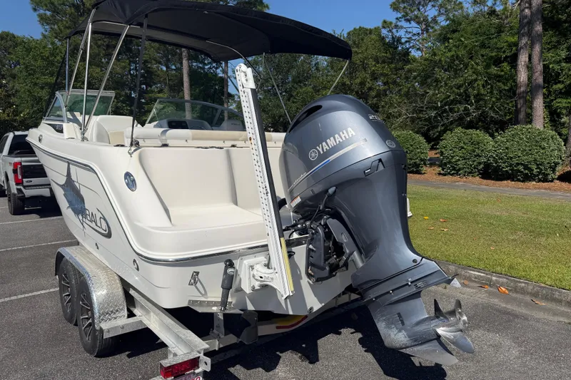 Slide: The Image of 2015 Robalo R227 Dual Console boat with Yamaha outboard motor on trailer. - 4