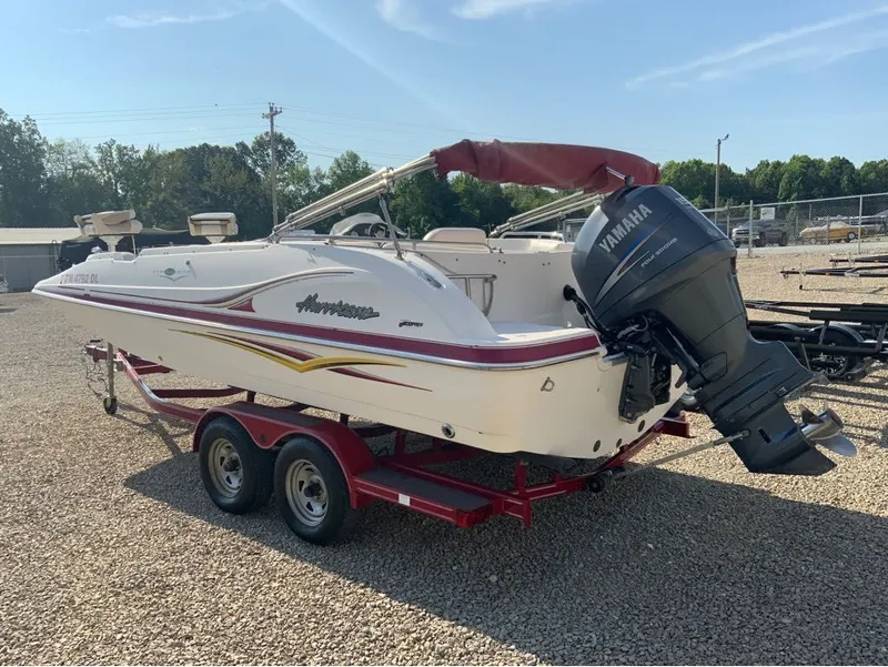 Slide: The Image of 2005 Hurricane GS202 boat with Yamaha outboard motor on trailer. - 11