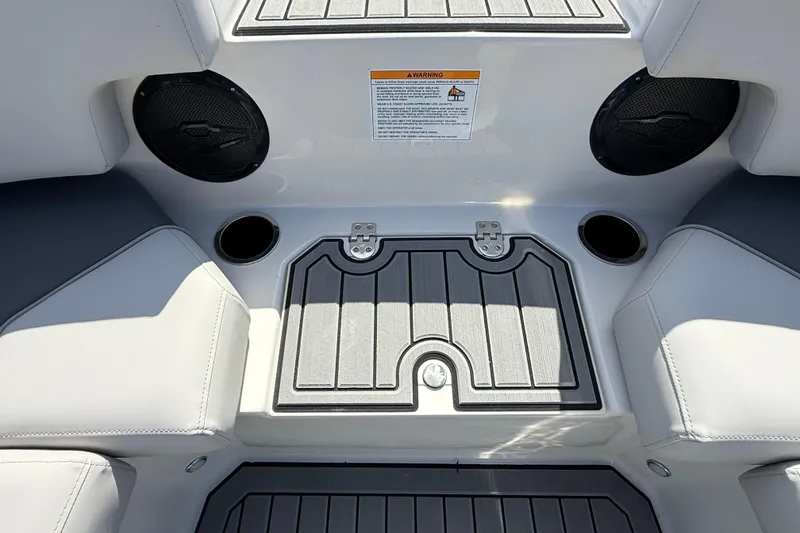 Slide: The Image of Interior of 2026 Starcraft SVX 211 OB boat with seating and cup holders. - 11