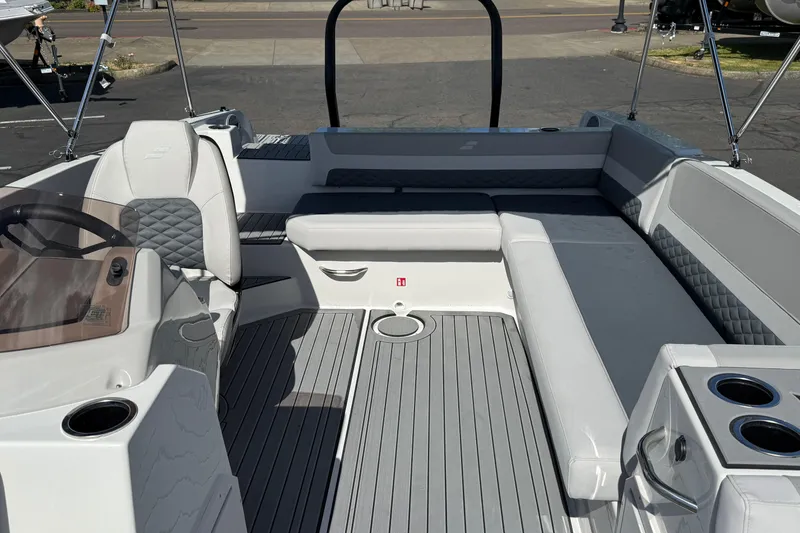 Slide: The Image of 2026 Starcraft SVX 211 OB boat interior with gray seating and modern design. - 7