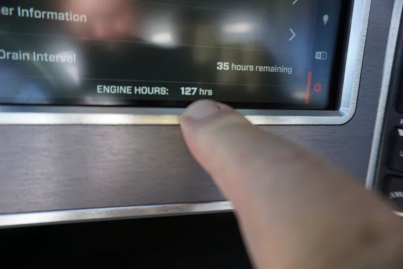 Slide: The Image of MasterCraft XT22 T 2023 display showing 127 engine hours. - 15