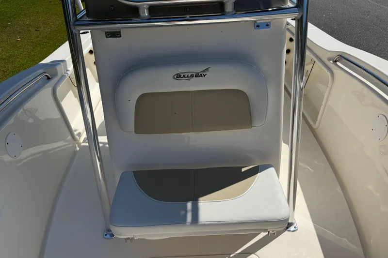 Slide: The Image of 2022 Bulls Bay 200 Center Console boat seat with logo, featuring stainless steel frame. - 14