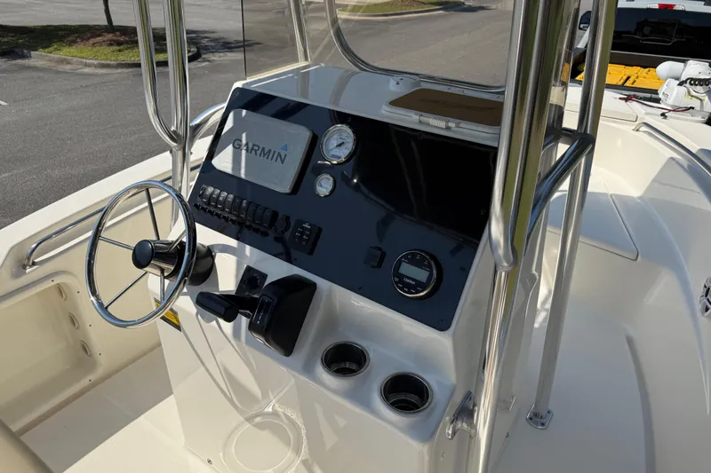 Slide: The Image of 2022 Bulls Bay 200 Center Console boat dashboard with Garmin navigation system. - 24
