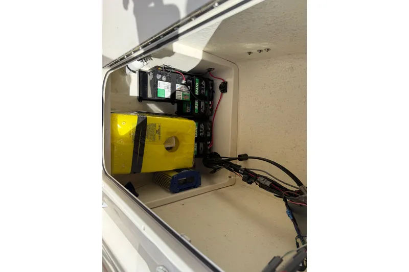Slide: The Image of Bulls Bay 200 Center Console 2022 battery compartment with wiring. - 25